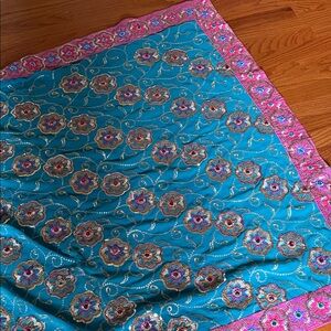 Elegant Teal and Pink Embroidered saree